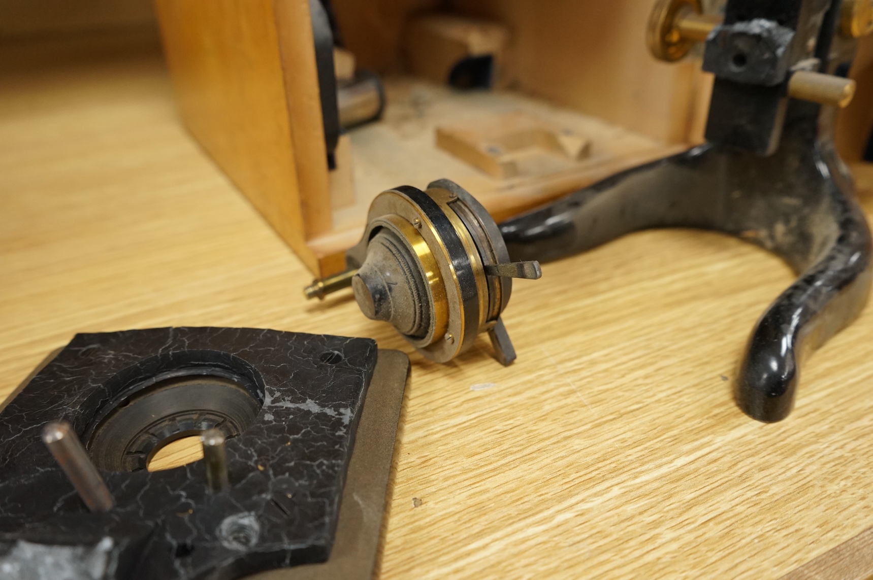 An early 20th century E. Leitz, Wetzlar, monocular microscope, in a cedar case, together with a number of alternative lenses and other accessories, case height 37.5cm.